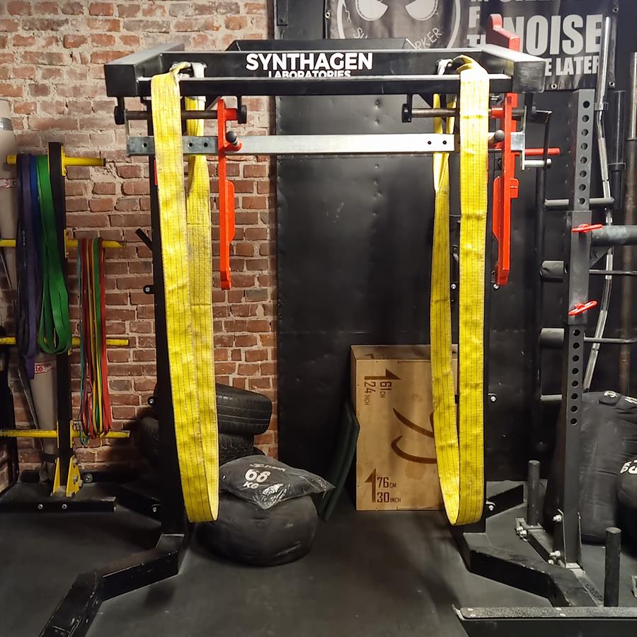 Power cage with resistance bands and a sandbag